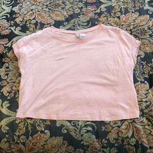 Light pink crop top with folded sleeves